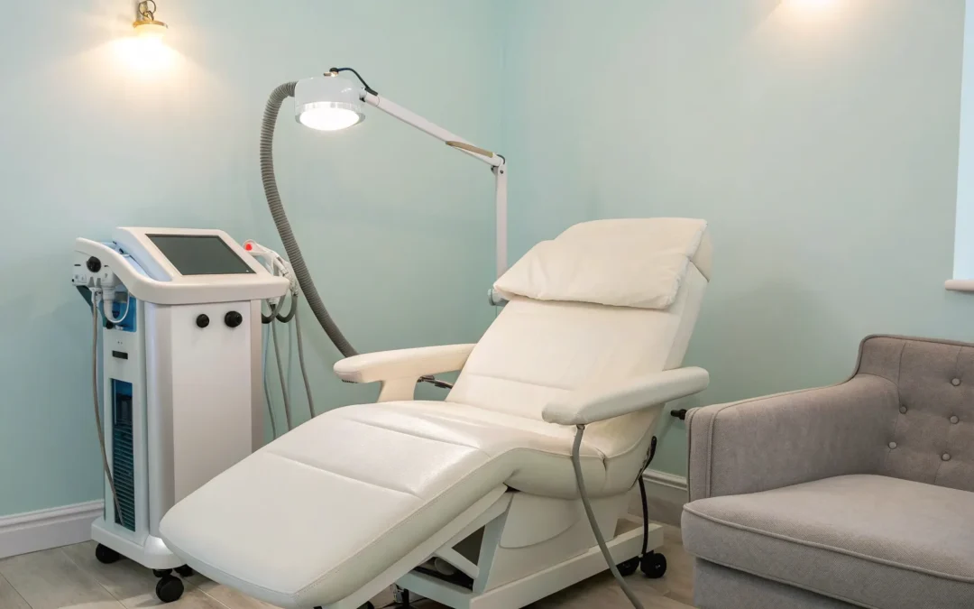 A modern treatment room with an advanced laser liposuction machine and patient chair.
